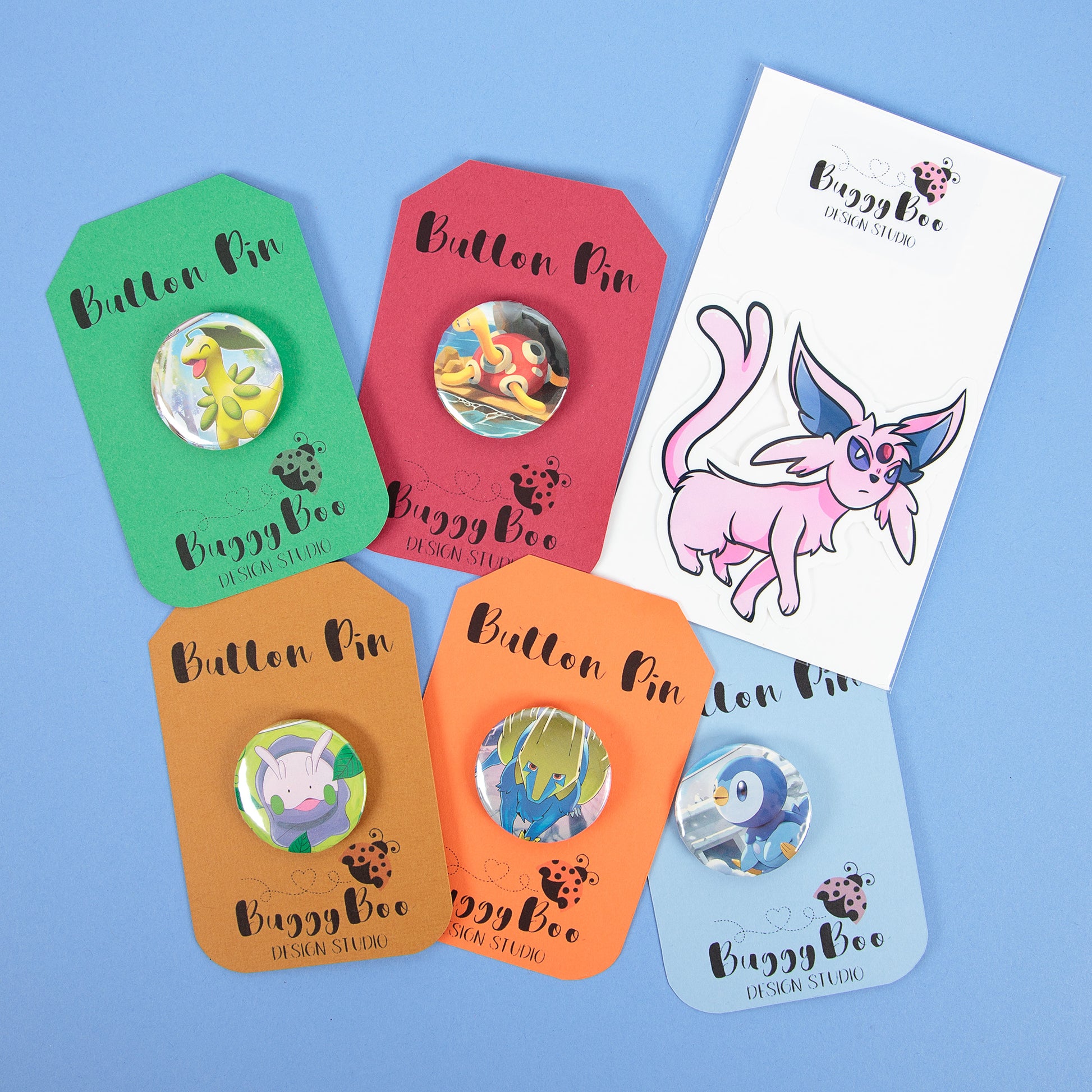 Pokemon Mystery Bag - Includes (5) Pokemon Card Buttons and (1) Sticke BuggyBoo Design Studio Pokemon Mystery Bag - Includes (5) Pokemon Card Buttons and (1) Sticke BuggyBoo Design Studio